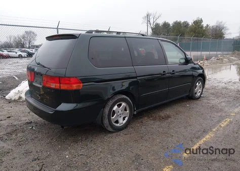 2001 Honda Odyssey Ex z USA, uszkodzony, nr VIN 2HKRL18621H579087